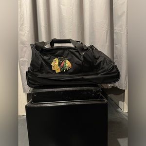 Chicago Blackhawks rolling duffel bag. Like new.